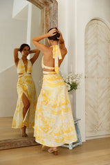 Sonnenlichtreflektionen Neckholder-Maxikleid Gelb